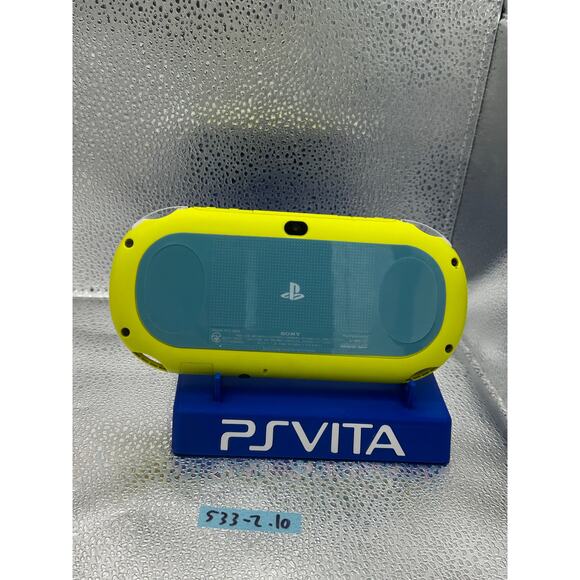white/yellow with a dash of light blue ps vita 2000 w/charger - Picture 3 of 8